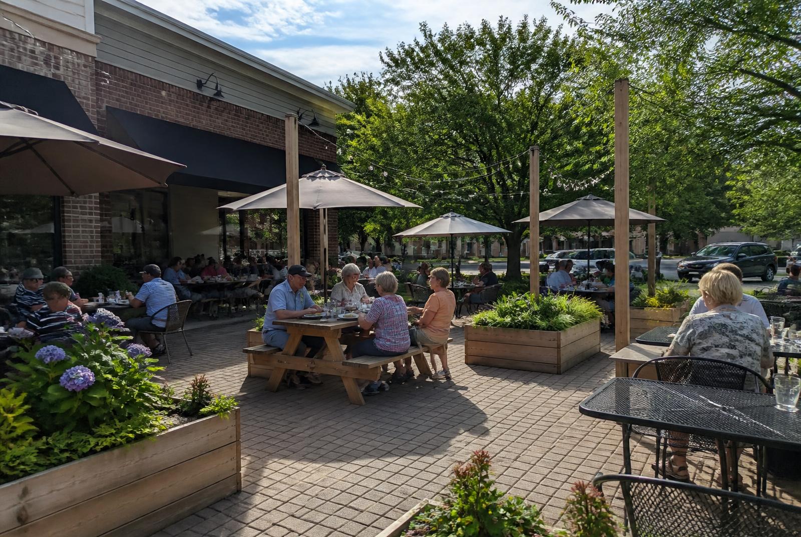 Outdoor dining patio at a luxury Marvin NC home