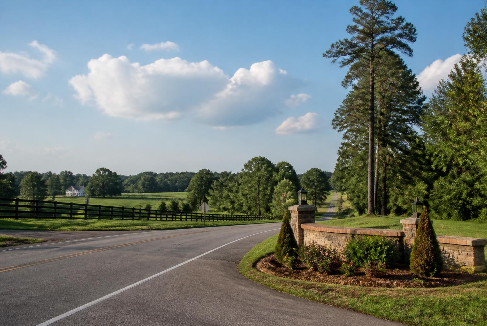 Country road and pasture fencing at the edge of the Village of Marvin, North Carolina